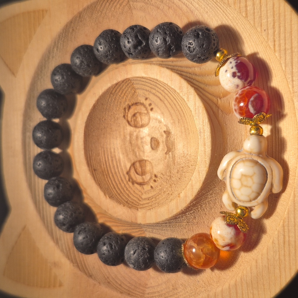 Red orca agate with acrylic turtle and lava beads